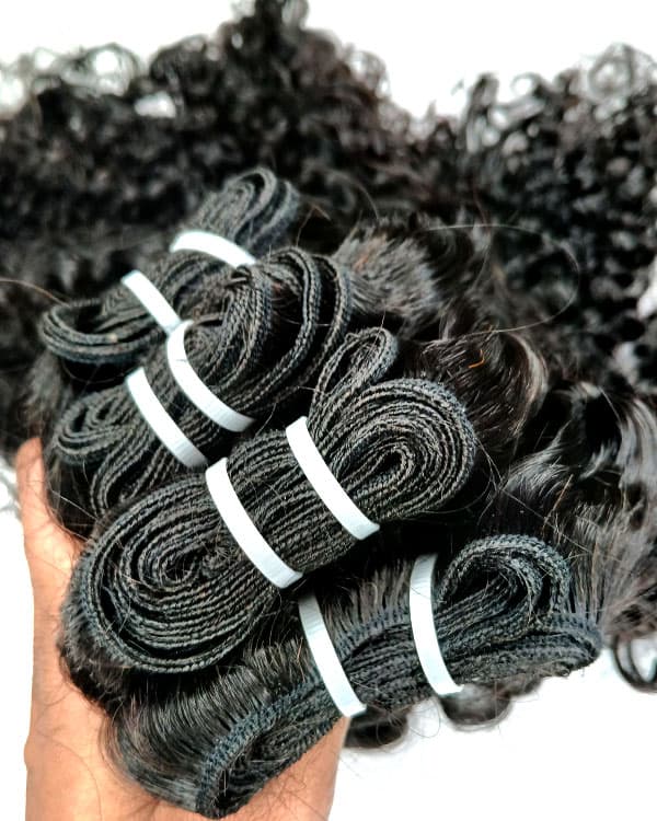 Achieve bold, voluminous curls with Bella Hararo’s 4 Bundles Deal in Kinky Curly Raw Indian Temple Hair