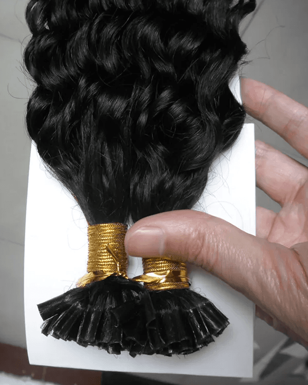 Achieve a bold, voluminous look with Bella Hararo’s Indian Remy Hair U-Tip Kinky Curly Extensions