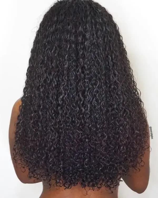 Embrace bold, voluminous curls with Bella Hararo’s Indian Remy Hair Weft Kinky Curly Extensions