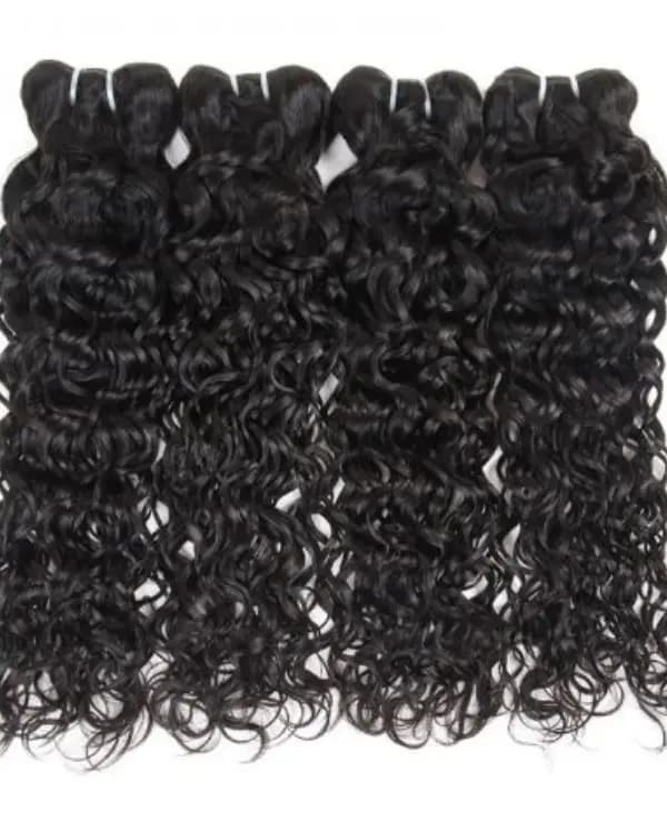 Unveil luxurious, voluminous curls with Premium Raw Indian Temple Wefted Hair in a stunning loose curly texture