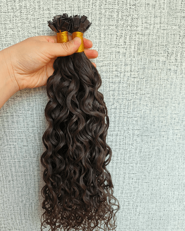 Achieve soft, voluminous curls with Bella Hararo’s Indian Remy Hair FLAT-Tip Loose Curly Extensions
