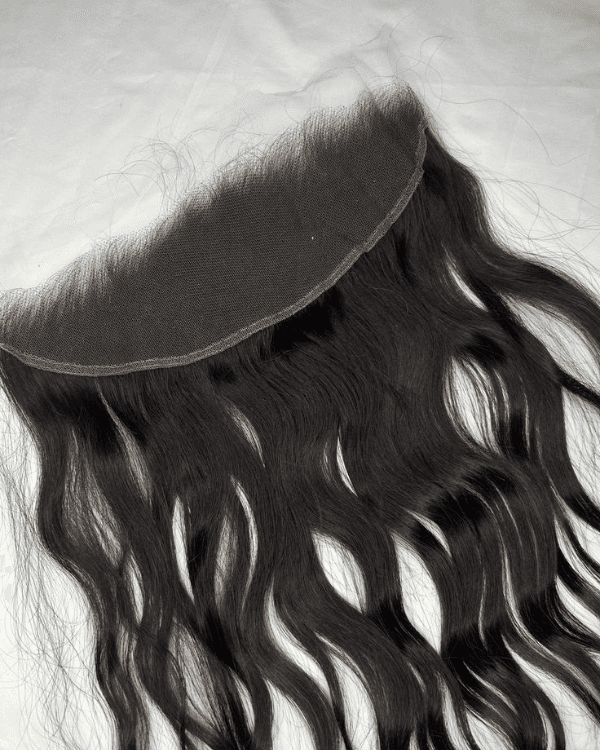 Elevate your look with Bella Hararo’s 13"x4" frontal extension, crafted with natural wavy texture for a realistic hairline and flawless blend with your own hair