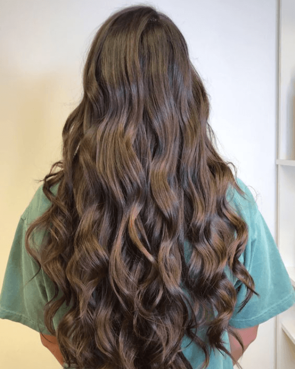 Transform your look instantly with Bella Hararo's 3 PCS Set Premium Natural Wavy Clip-In Hair Extensions