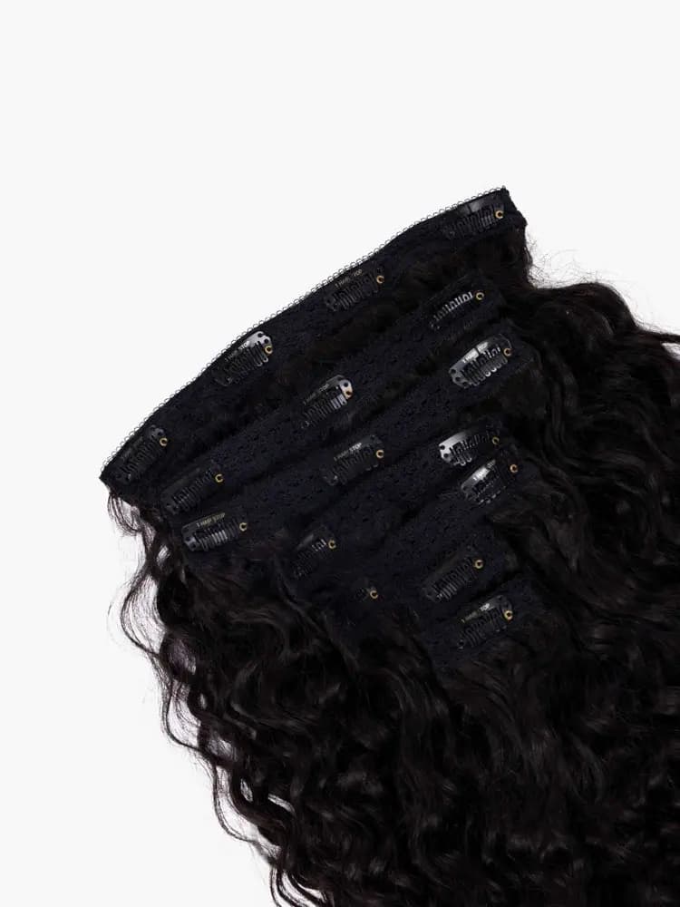 Achieve gorgeous, bouncy curls instantly with Bella Hararo’s 7 PCS Set Premium Curly Clip-In Extensions! Made from 100% natural human hair, these full-bodied, voluminous extensions blend seamlessly for a naturally curly, stylish look—perfect for any occasion
