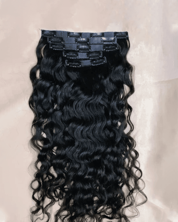 Get fuller, bouncier curls instantly with Bella Hararo’s 5 PCS Set Premium Curly Clip-In Extensions! Made from 100% natural human hair, these extensions provide maximum volume, length, and well-defined curls, blending seamlessly with your natural hair