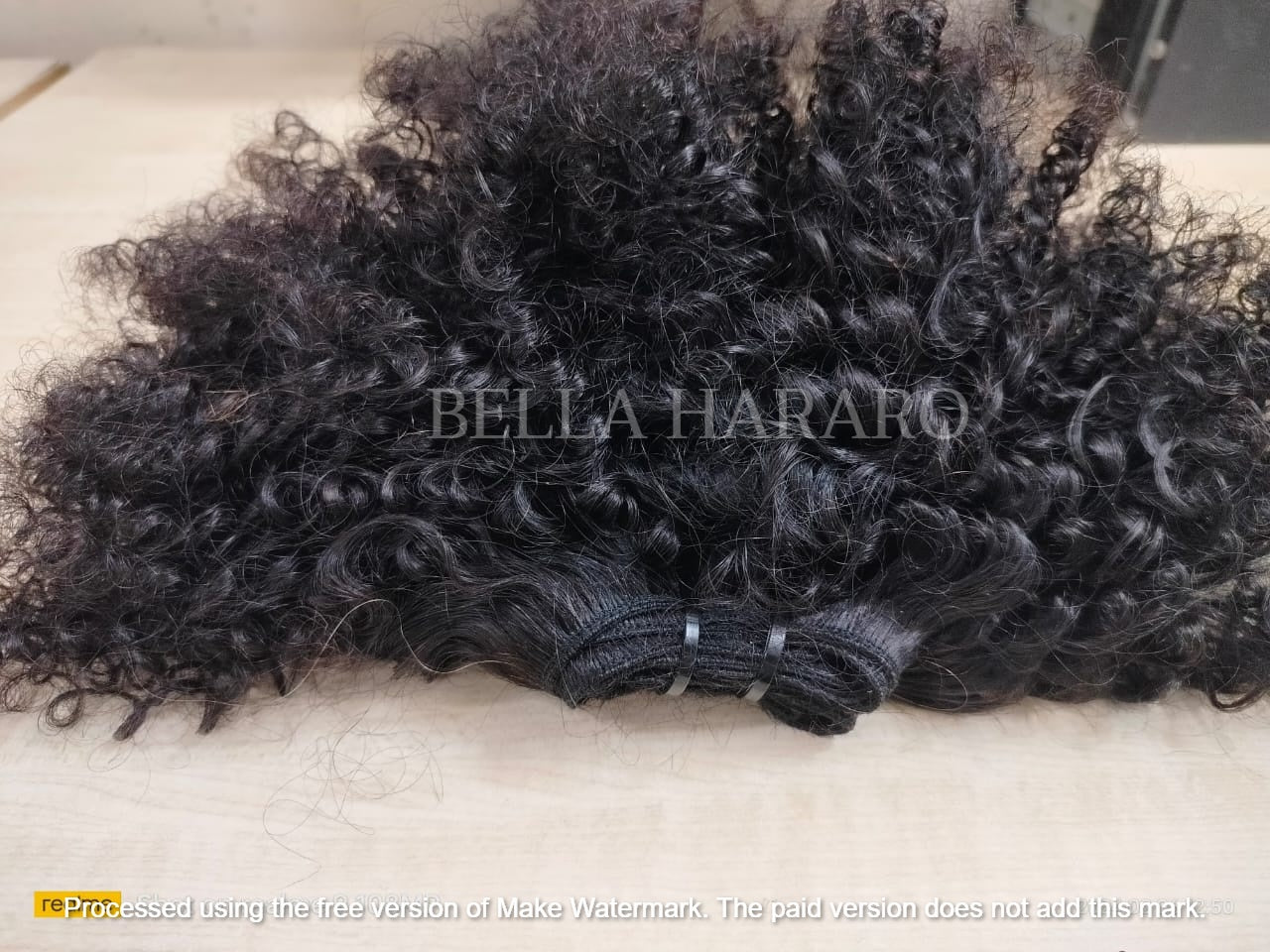 Raw Unprocessed Indian Hair Weft  In Single Drawn Afro Curly Texture  In Natural Black Color (Pack Of 1 Bundle)